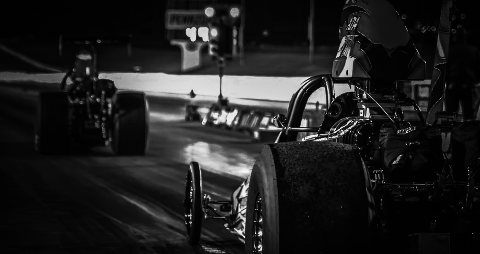 Dragster staged at night